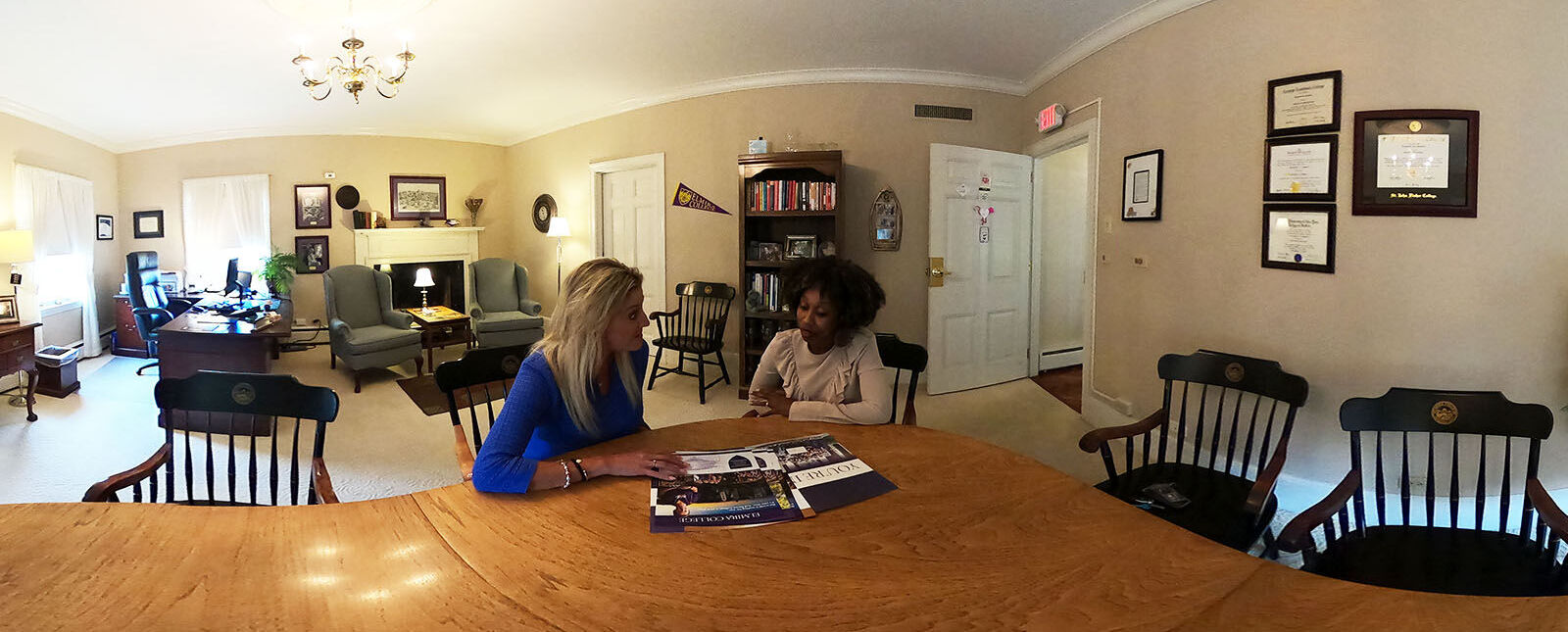 An admissions counselor meets with a prospective student