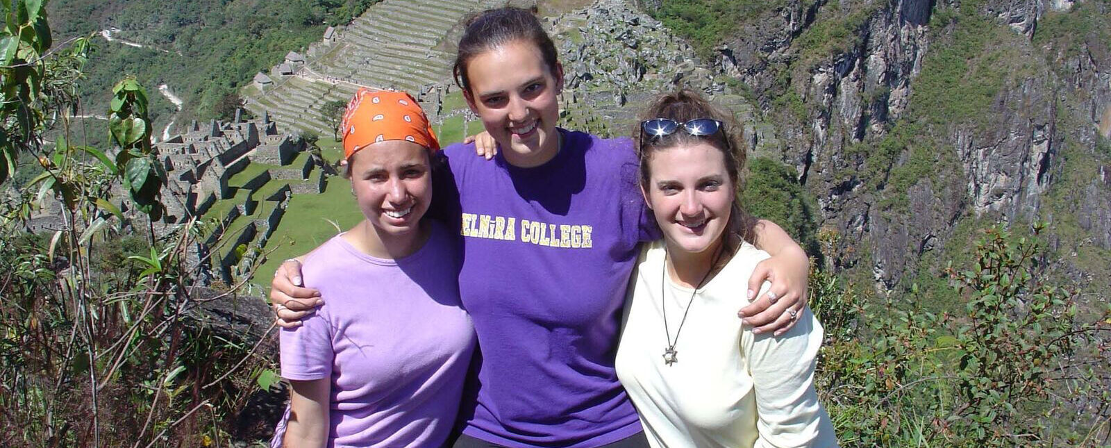 Three female students pose together during a Term III study abroad trip